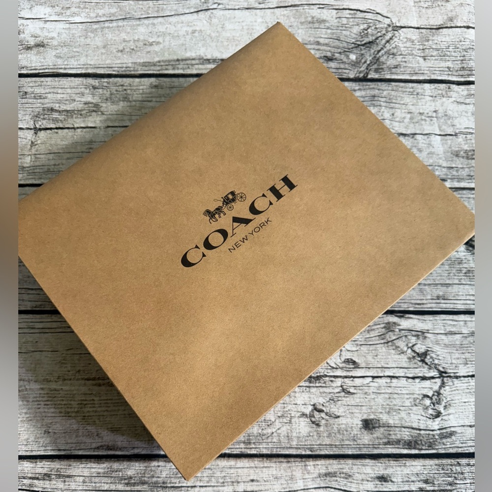 New. Coach large gift box + tissue paper. 10.5 x 12.5 x 4.5 in. Logo printed